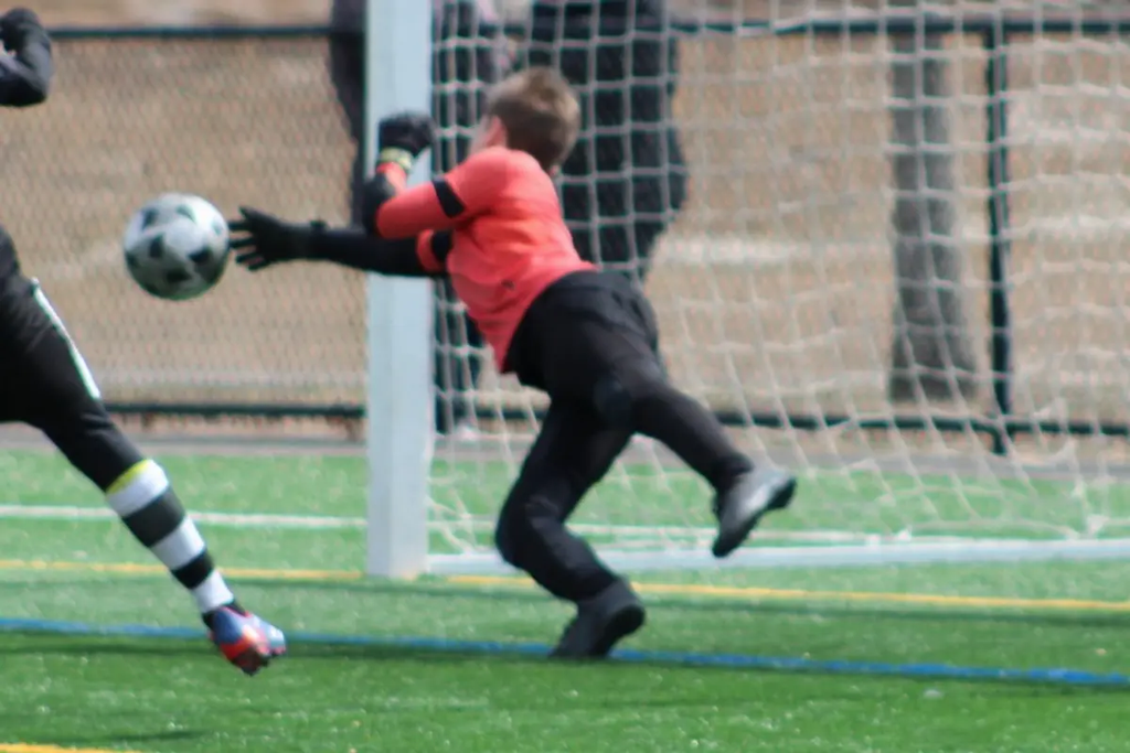 Kid top goalie soccer